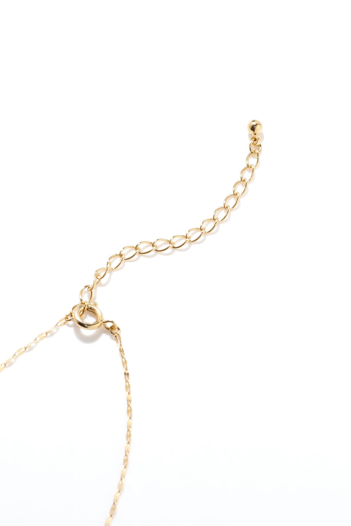 ジュエリースタジオMASHIROのカラーストーンアップサイクルジュエリー。マルチカラーサファイアをセットした、贅沢なペタルチェーンの花火デザインネックレス。シャンパンゴールド。