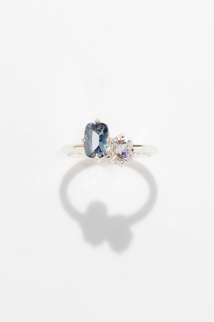 ジュエリースタジオMASHIROのアップサイクルジュエリー。レインボームーンストーン・オクタゴンカット・約0.60ct・約3*6mm・マダガスカル産｜バイカラータンザナイト・クッションカット・約0.84ct・約7.1*5mm・タンザニア産。スターリングシルバーのコンビリング。