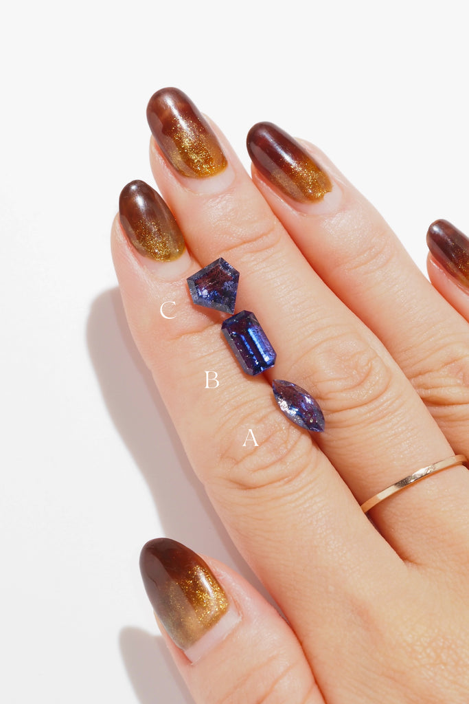 ジュエリースタジオMASHIROがお届けする宝石たち。ブラジル産アイオライトサンストーン・スパークリングギャラクシー。A：マーキスカット・1.16ct5*11.5mm。B：オクタゴンカット・2.01ct・5.7*10mm。C：ペンタゴンカット・1.38ct・8.5*8.6mm