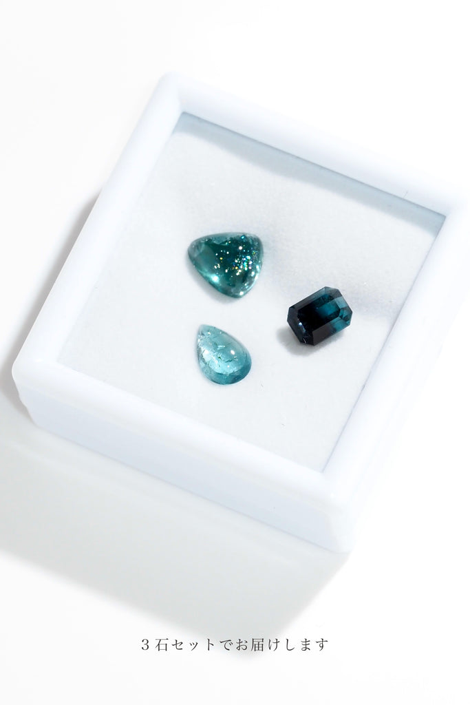 ジュエリースタジオMASHIROのルース（宝石）販売ページ。ブラジル産とアフガニスタン産極上のブルートルマリン＆インディゴブルートルマリン３石セット。異ンクブルートルマリンバイカラー・オクタゴンカット、インディゴブルートルマリン・トリリアントカボション、ブルートルマリンペアシェイプカボションの３石セット。